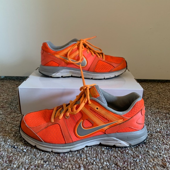 bright orange nike running shoes
